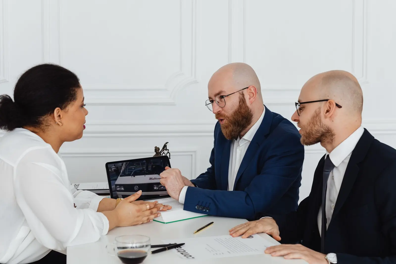 Technology consultants discussing a business requirement